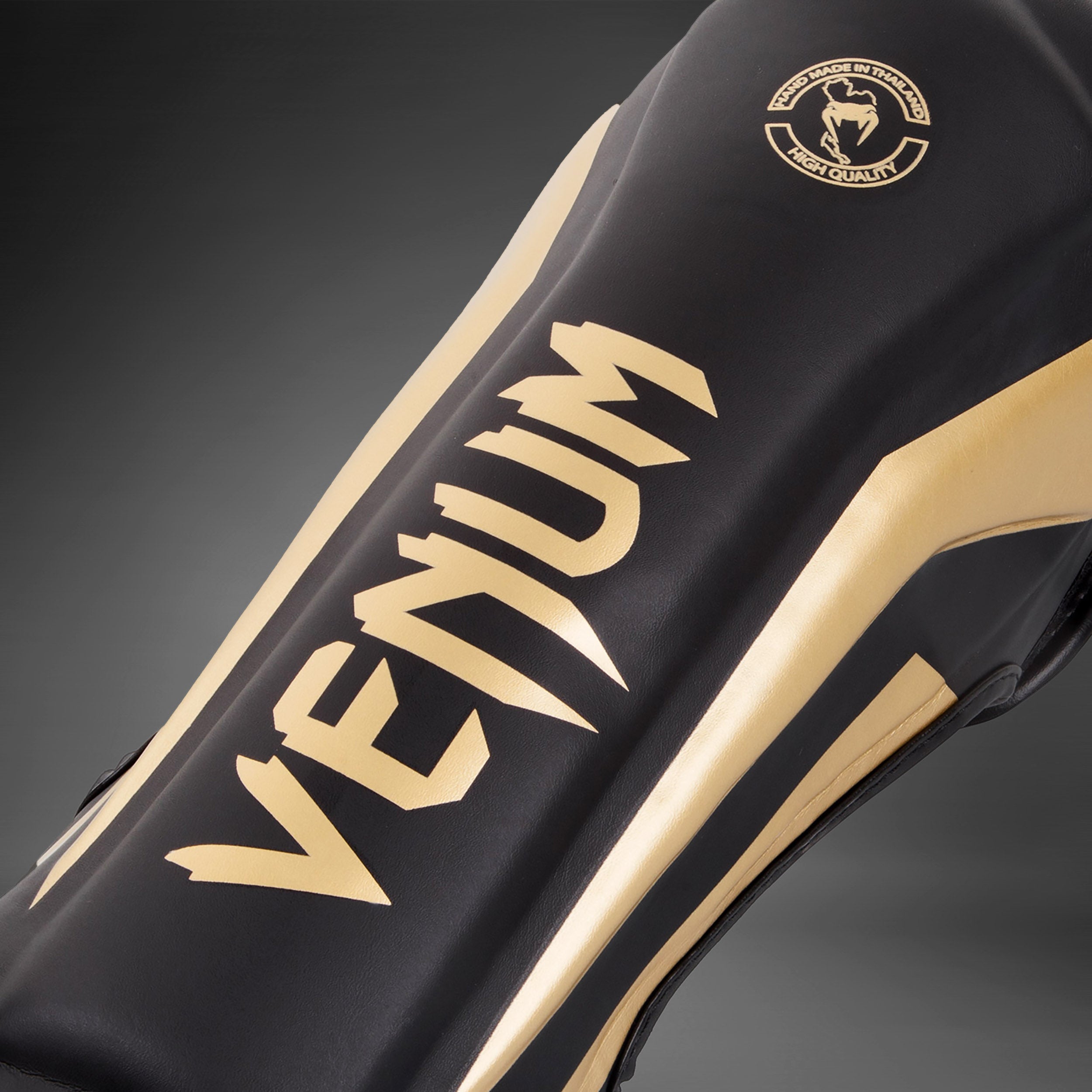 Protège-tibias Venum Elite - Noir/Doré